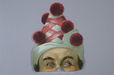 Clown con cappello ornato di pompon