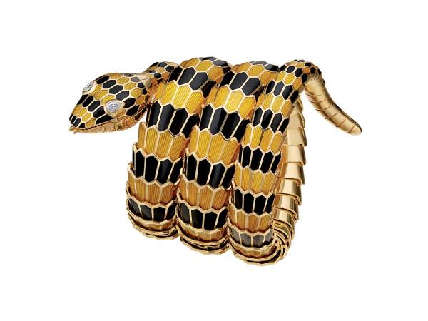 Bracciale-orologio Serpenti in oro con smalto giallo e nero e diamanti. Serpenti bracelet-watch in gold with yellow and black enamel and diamonds. ca 1970 Bulgari Heritage Collection Bracciale-orologio Serpenti in oro con smalto giallo e nero e diamanti. Serpenti bracelet-watch in gold with yellow and black enamel and diamonds. ca 1970 Bulgari Heritage Collection